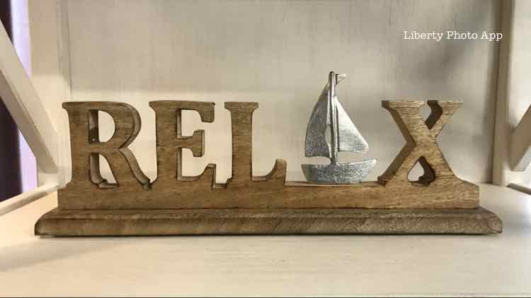 Relax Word Figure with Metal Boat